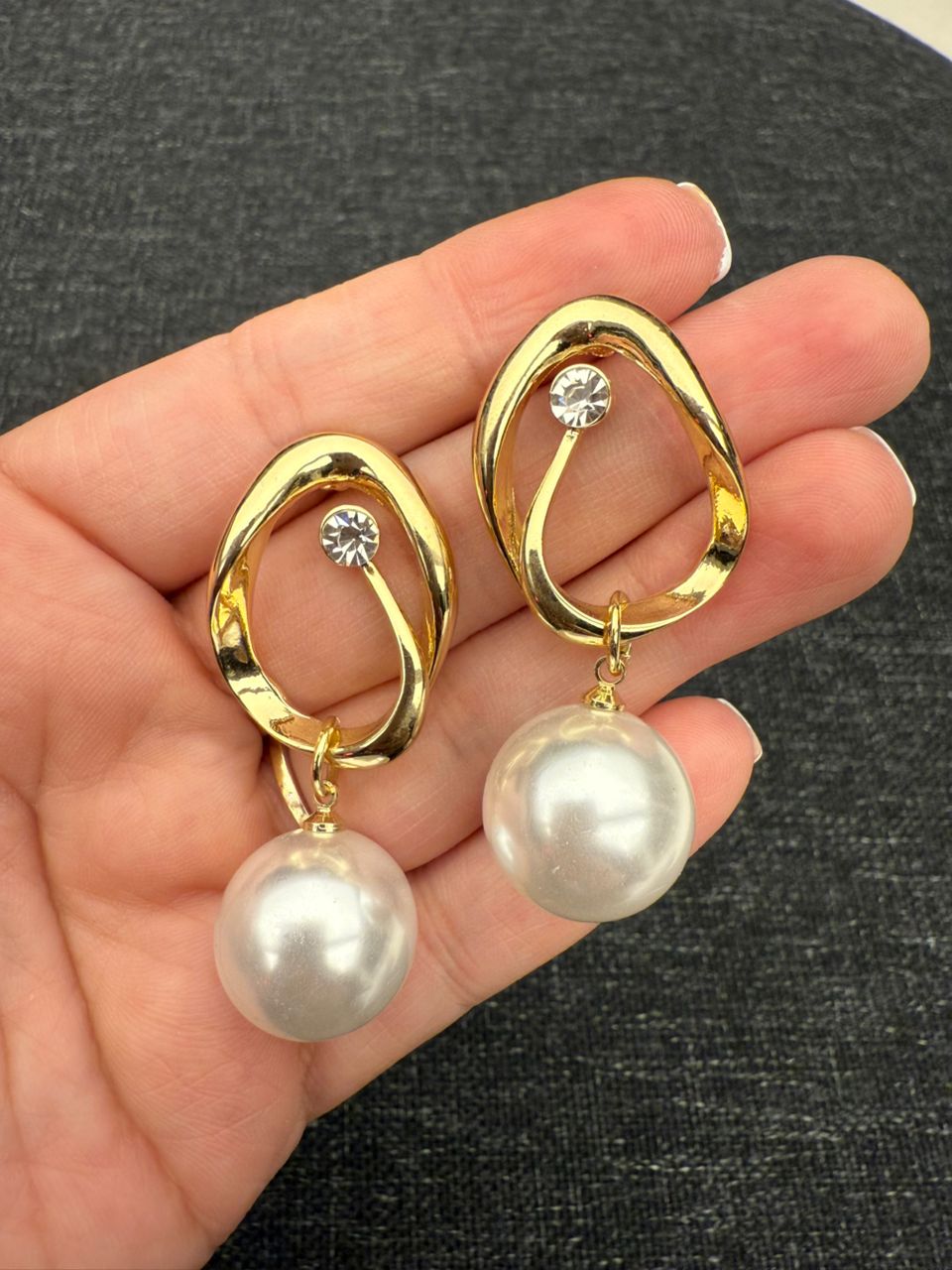 Gold teardrop earrings with pearls