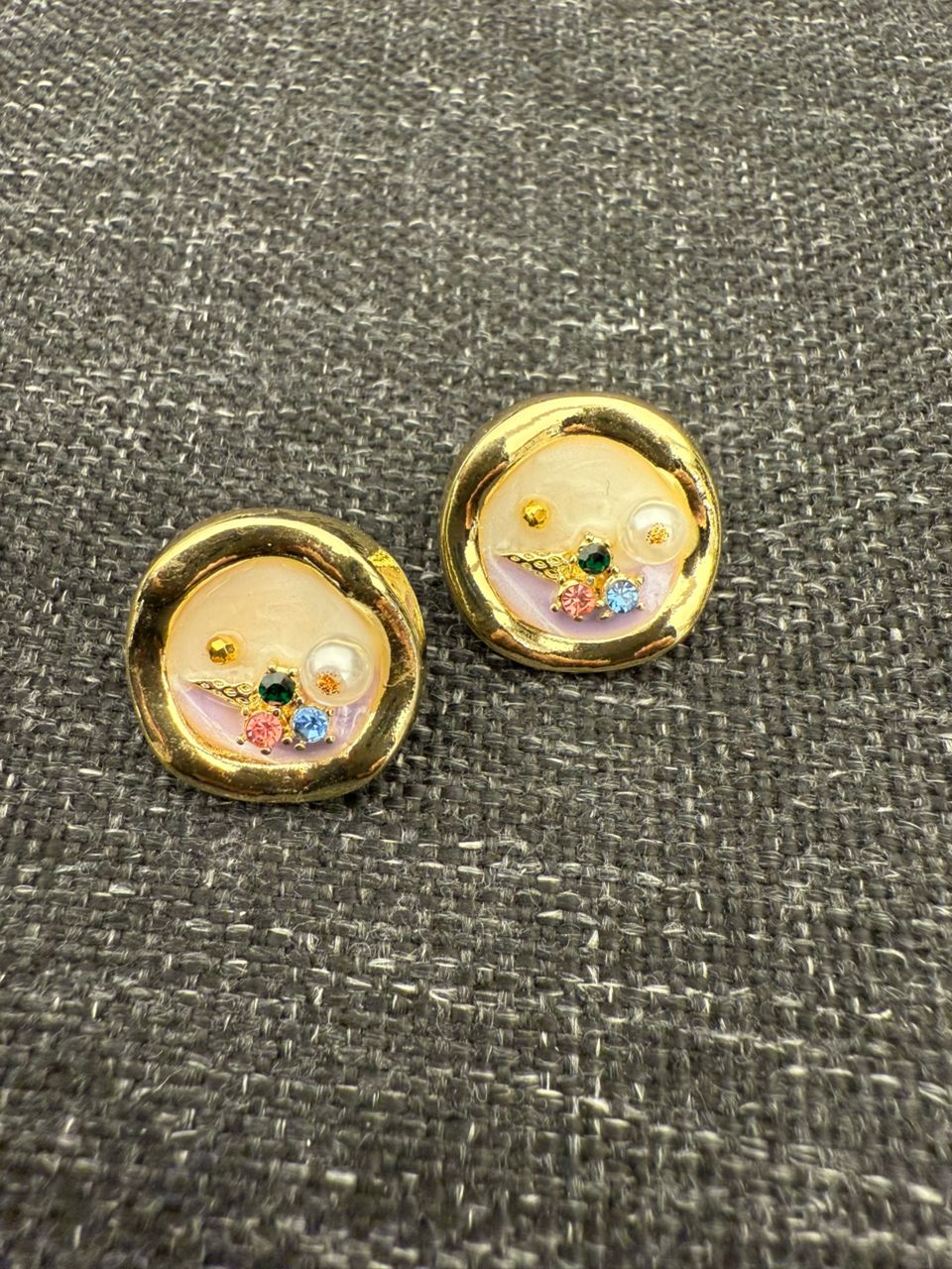 Gold circle earrings with gems and pearls